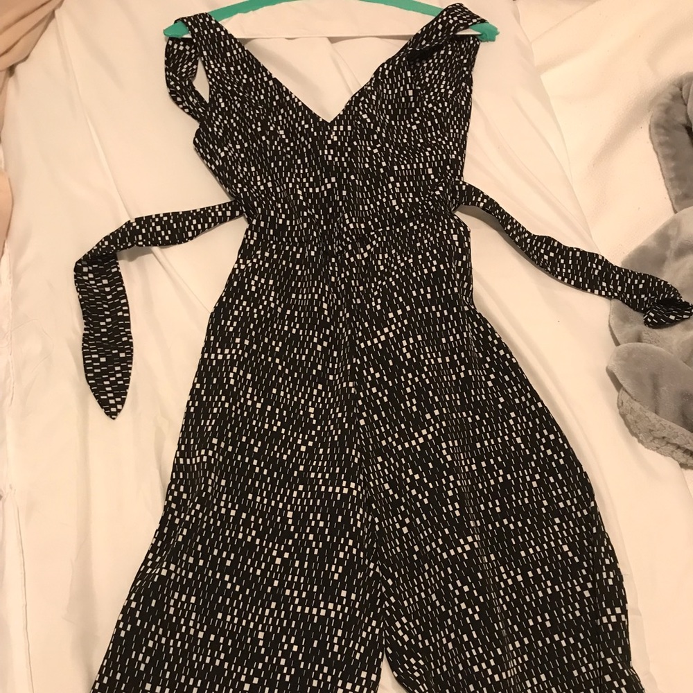 Lily rain jump suit size small